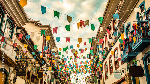 Fotografia Brazilian june party (festas juninas) street decoration, with colorful flags and
