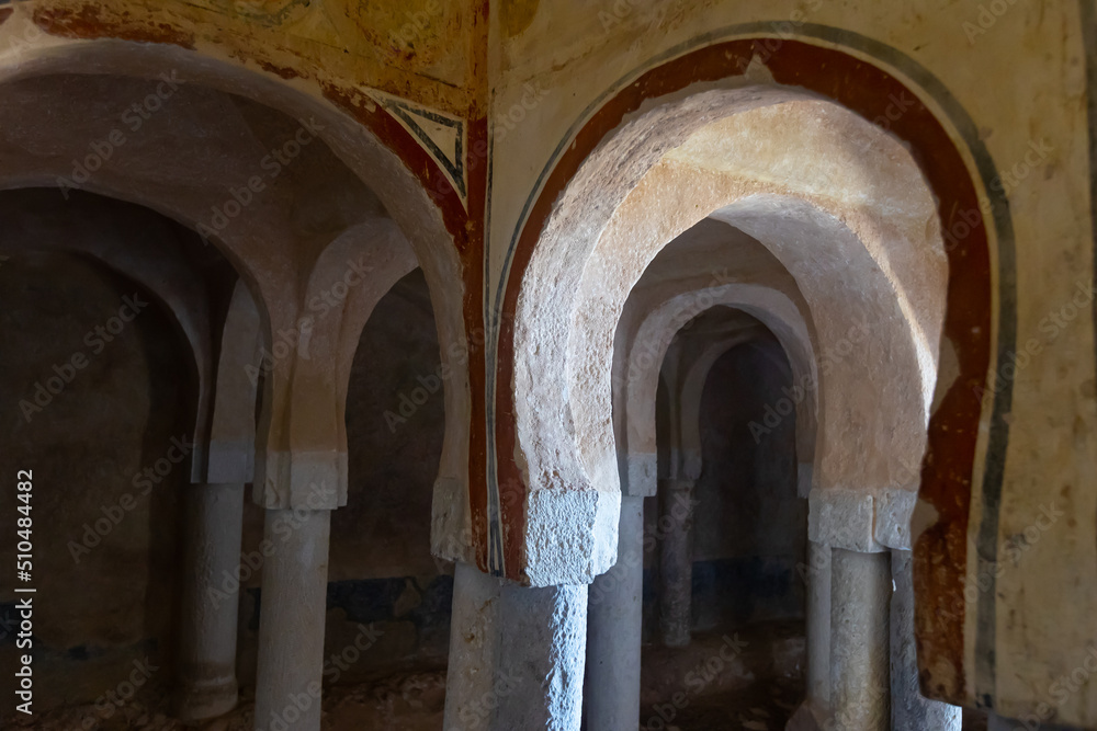 Internal view of Hermitage of San Baudelio de Berlanga, Caltojar, Spain. Rows of pillars and arches.