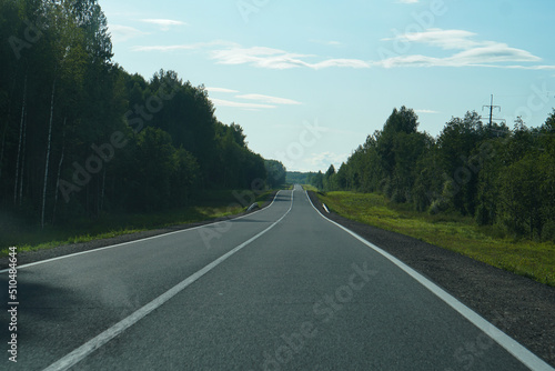 Empty highway through the forest. Beautiful summer landscape background. Travel © subjob