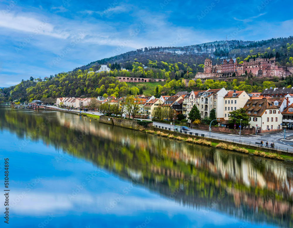 Heidelberg river side town and palace during a summer day in Germany