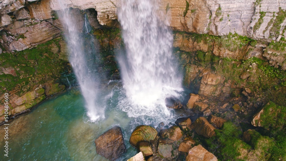 Panorama of big and small waterfalls next to each other, scenic drone shot, Georgia. High quality photo