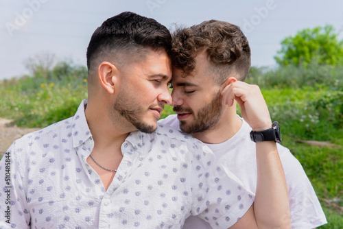 Homosexual couple in the park together  © MarcoLatino