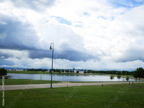 Wallpaper Mural Cloudy skies over a lake Torontodigital.ca