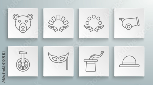 Set line Unicycle or one wheel bicycle, Hand holding playing cards, Festive mask, Magician hat, Clown, Juggling ball, Cannon and Bear head icon. Vector