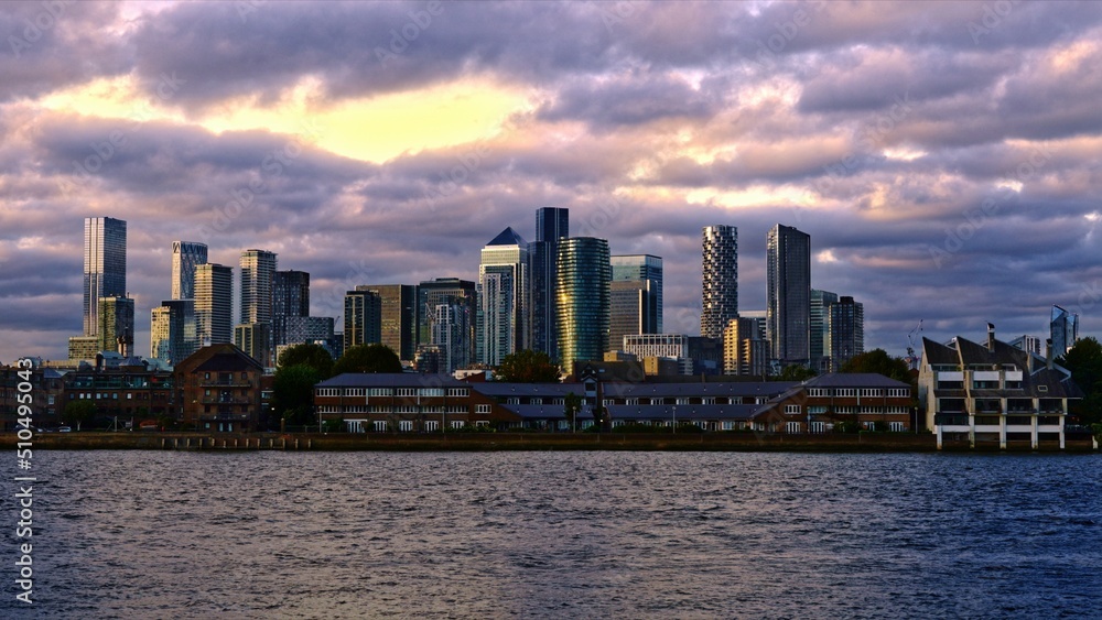 A purple sky over Canary Wharf, London, Uk (Logos removed)