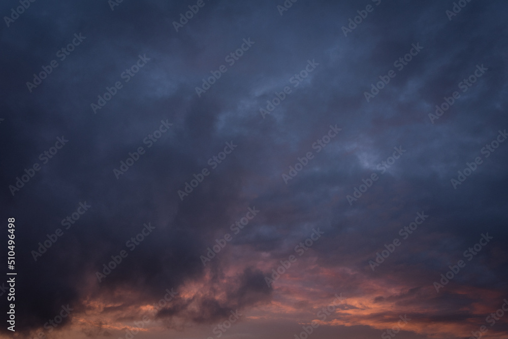 Dark blue and pink sunset clouds