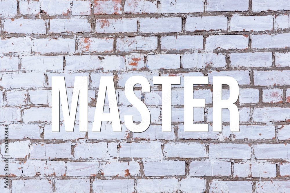MASTER - word on concrete background. Cement floor, wall. MASTER - word on concrete background. Cement floor, wall.