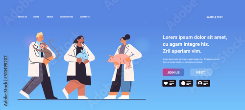mix race scientists doing experiments in lab with experimental animals biological genetic engineering