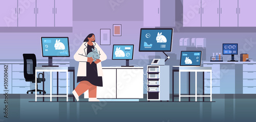 scientist work on desktop with rabbits on screens veterinary worker doing experiments in lab biological genetic engineering research