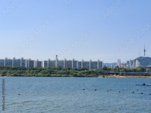 Han River with panoramic view of riverside apartments and Seoul Tower on Namsan mountain  © Kpictures