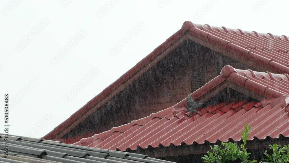 In the rainy season, it rains from the roof of a wooden house. Macro Video Slow Motion. In the rainy season, it rains from the roof of a wooden house. Macro Video Slow Motion.