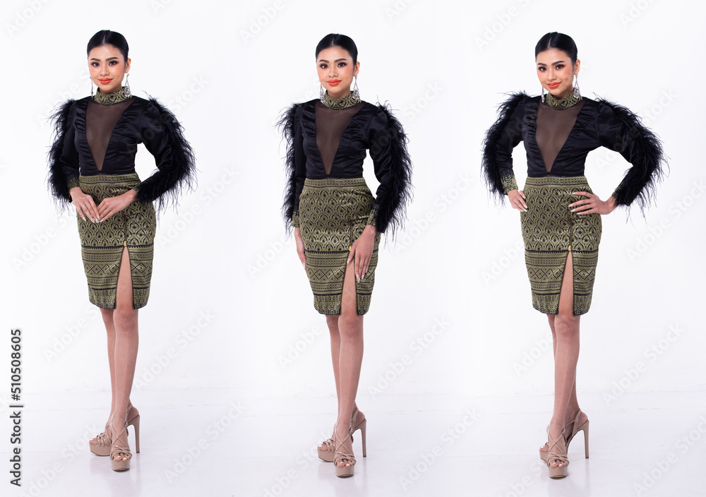 Fototapeta premium Full length of Young Asian 20s Beautiful Woman, look at camera, wear Sparkling Sequin Evening Gown high heels shoes