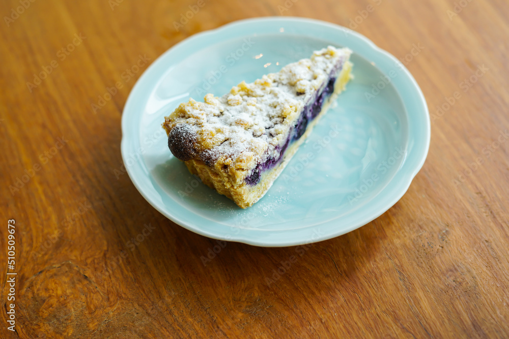 A piece of blueberry cake