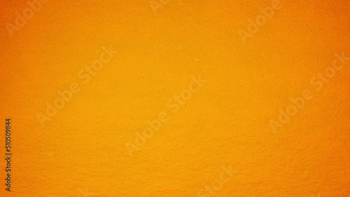 かぼちゃのようにゴツゴツしたオレンジ色の背景素材。