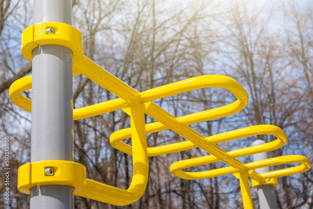 Elements of workout and fitness outdoor street area. Gymnastic or athletic gym equipment in city public park street