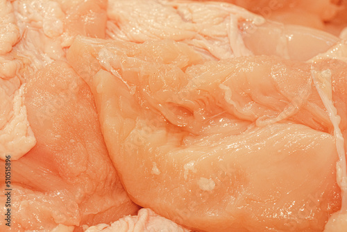 Raw chicken fillets close up