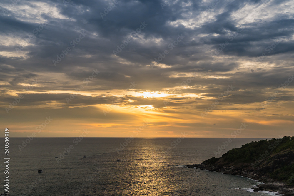 The sun is falling in sunset time at Promthep Cape in Phuket, Thailand.