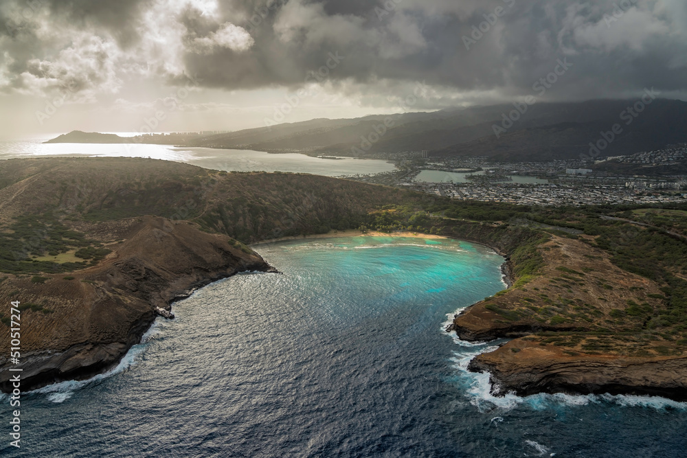 Aerial panorama of Hanauma Bay with water cliffs and Koko crater summit in the background, Oahu Island Aerial panorama of Hanauma Bay with water cliffs and Koko crater summit in the background, Oahu Island