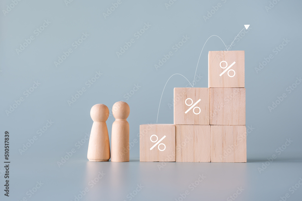 Wooden blocks and figures concept of increasing in percentage step up progress can be savings, or other business related. Wooden blocks and figures concept of increasing in percentage step up progress can be savings, or other business related.