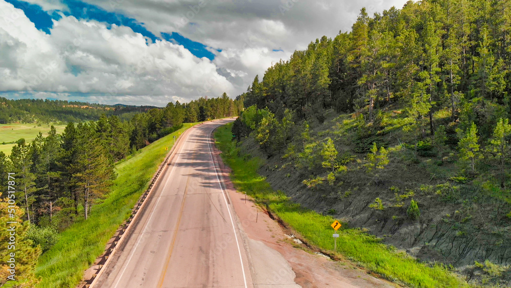 Obraz premium Aerial view of Devils Tower surrounding countryside in summer season, Wyoming