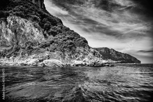 Beautiful view of Capri coastline from the sea in summer season, Italy