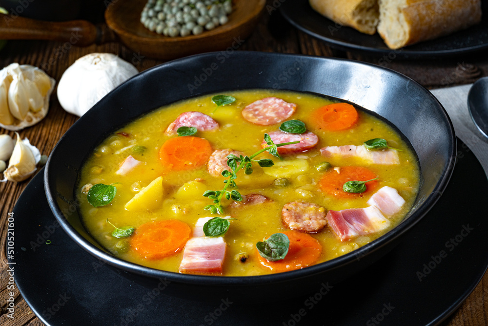 Hearty rustic pea soup with bacon and sausage Hearty rustic pea soup with bacon and sausage