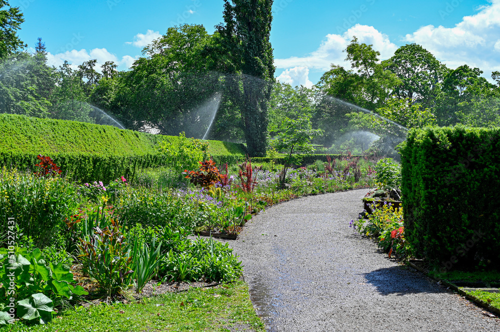 water sprinklers in public garden Orebro Sweden