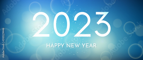 Happy new year 2023 incription on blurred background