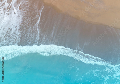 Aerial view Top view of Beach sand copy space Beautiful sea waves in Summer tropical background