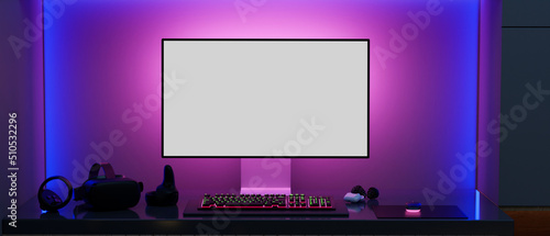 Modern gamer computer desk setup with RGB lights on the background, PC computer