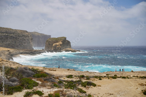 Wild coast at Gozo island, Malta on a windy day in June 2022. 