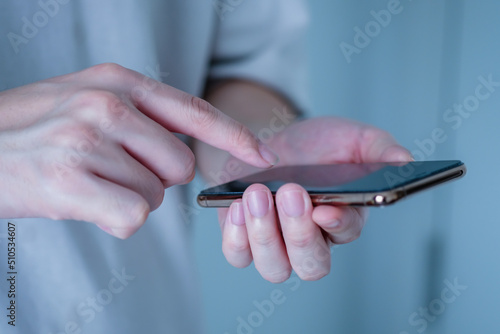 Close up of a man using mobile smart phone. Online communication. Concepts of telephone and technology