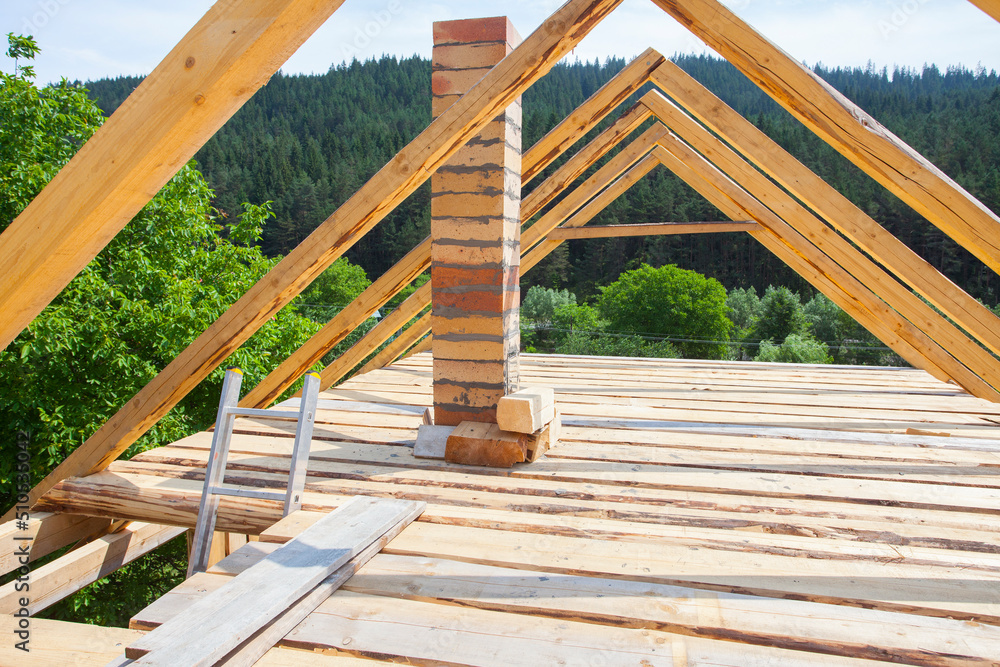 house construction on the roof and chimney