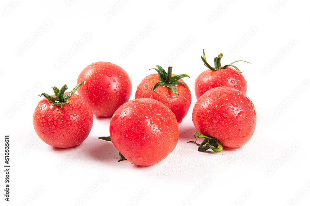 pile of cherry tomatoes isolated on white background.