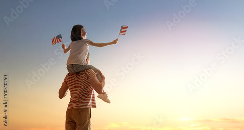 Patriotic holiday, family with American flag