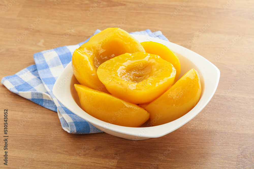 Sweet canned peaches with syrope Sweet canned peaches with syrope