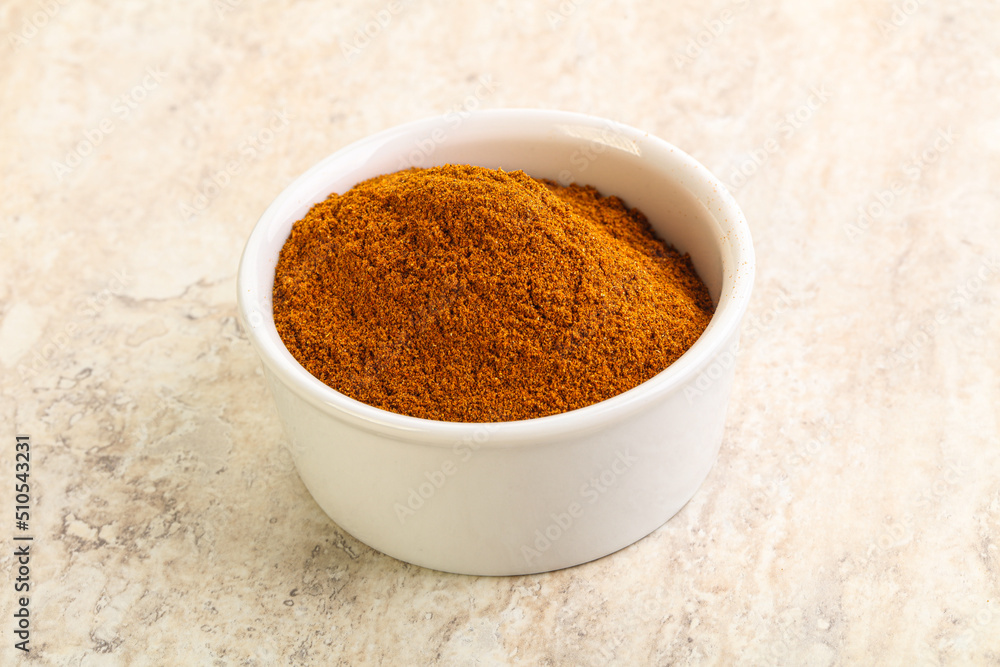 Dry Paprika powder in the bowl Dry Paprika powder in the bowl
