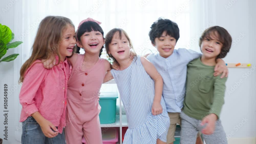 Mixed race Group of young children student playing together in school. Mixed race Group of young children student playing together in school.