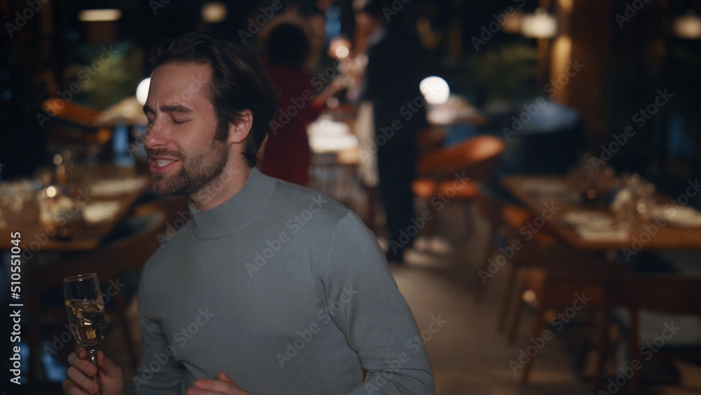 Drinking man dancing party on restaurant celebration. Happy guy enjoy fun in bar Drinking man dancing party on restaurant celebration. Happy guy enjoy fun in bar