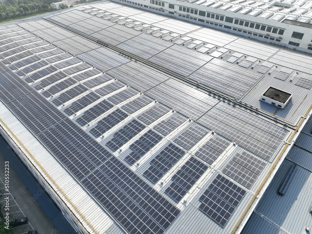 Fototapeta premium solar panels on factory rooftop