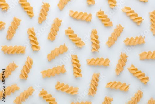 Pattern made of pasta on pastel background. Flat lay.