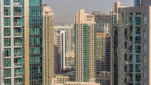 Aerial cityscape timelapse with modern architecture of Dubai downtown.