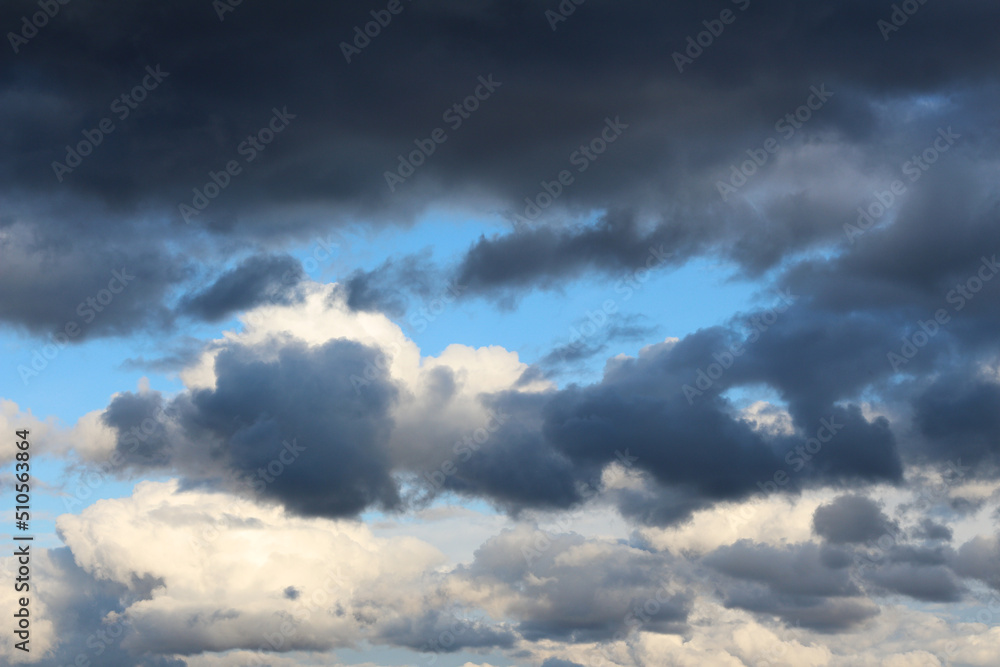 Dark storm clouds on blue sky. Before the rain Dark storm clouds on blue sky. Before the rain