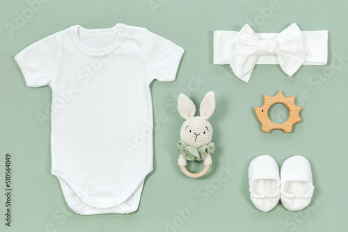 Fotografiet Cotton baby bodysuit for mockup on a mint green background