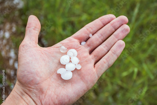 Background of hailstones in the hand, a lot of hailstones