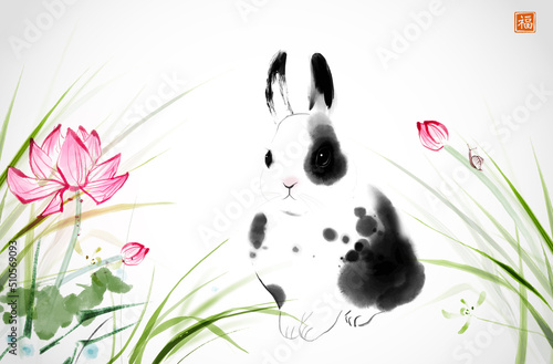 Rabbit, green grass and pink lotus flowers. Traditional oriental ink painting sumi-e, u-sin, go-hua. Translation of hieroglyph - well-being.