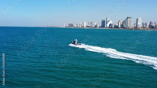 Wallpaper Mural Aerial Shot Of Nautical Vessel Moving In Ocean By Residential City Against Clear Sky - Tel Aviv-Yafo, Israel Torontodigital.ca