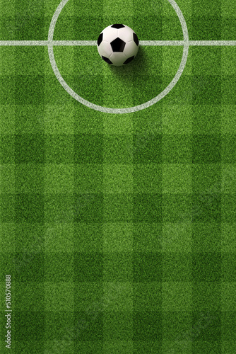 Soccer field or Football field with soccer ball on green grass background
