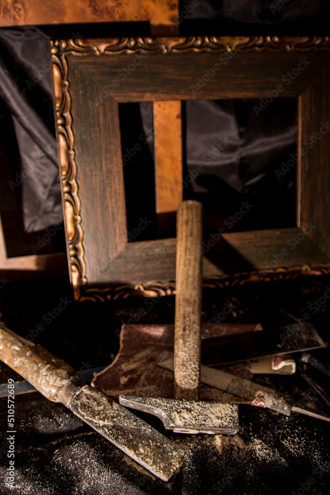 Frames and hammer in a carpenter workshop Frames and hammer in a carpenter workshop