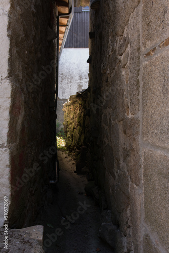 Stone alley in old village in Galicia
